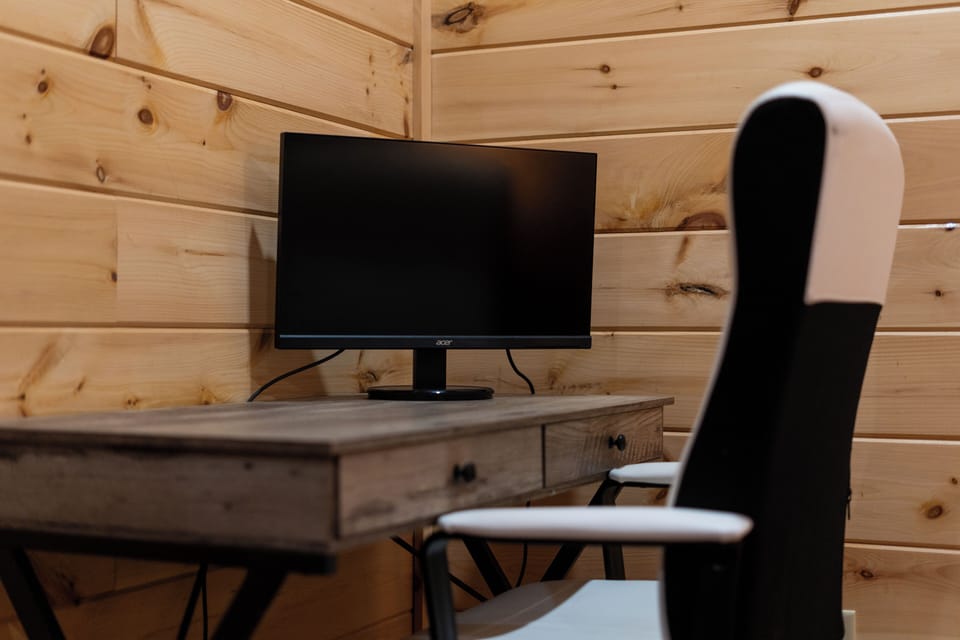 Work remotely in style with this cozy and modern cabin office setup!
