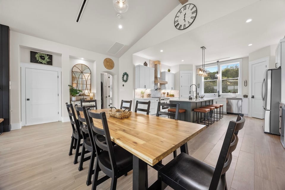 Dining table for 8 and seating for 5 at the countertop