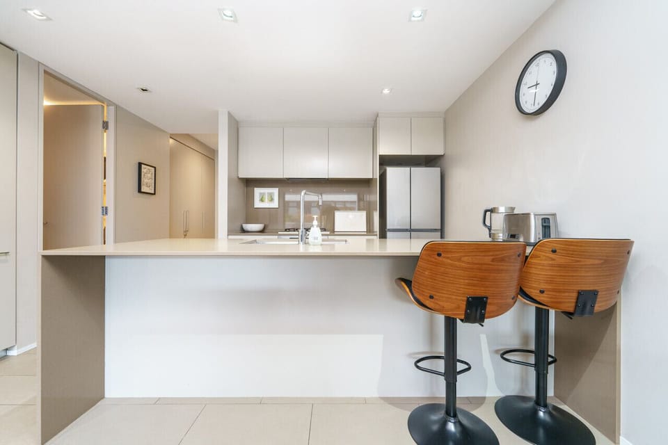 Fully equipped modern kitchen with sleek, stylish finishes.