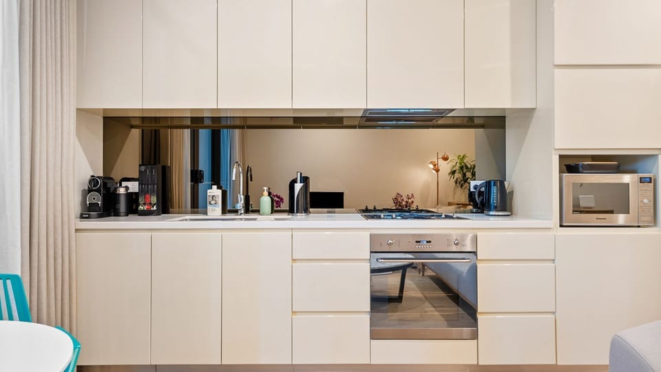 Fully equipped for your culinary adventures: Oven, stove, and everything you need to cook up a feast!