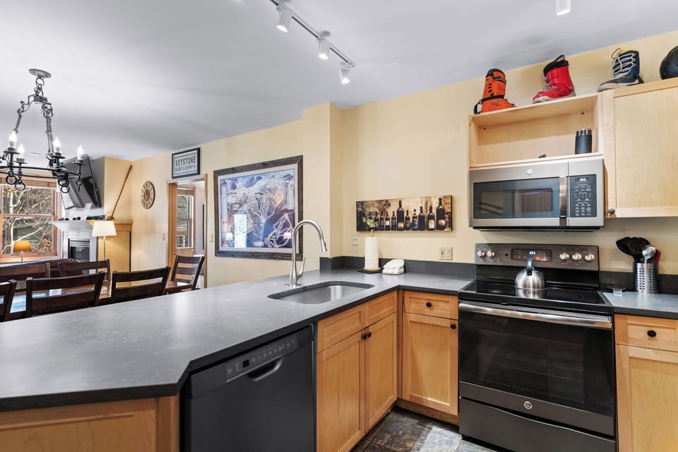 Your fully equipped kitchen awaits with sleek granite counters, stainless appliances, and everything needed to create memorable meals during your stay.