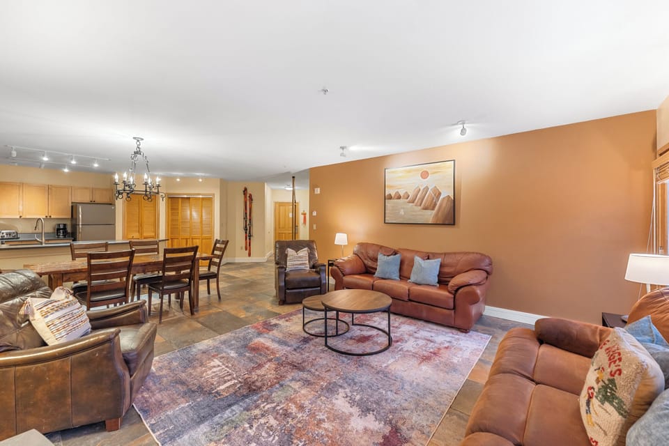 Sink into plush leather seating where warm earth tones and thoughtful touches create your perfect retreat for relaxation.
