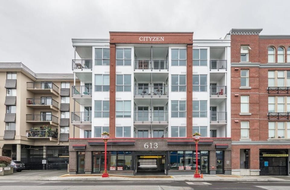 Welcome to the complex! Exterior front building facade of 613 Herald Street in downtown Old Town Victoria.