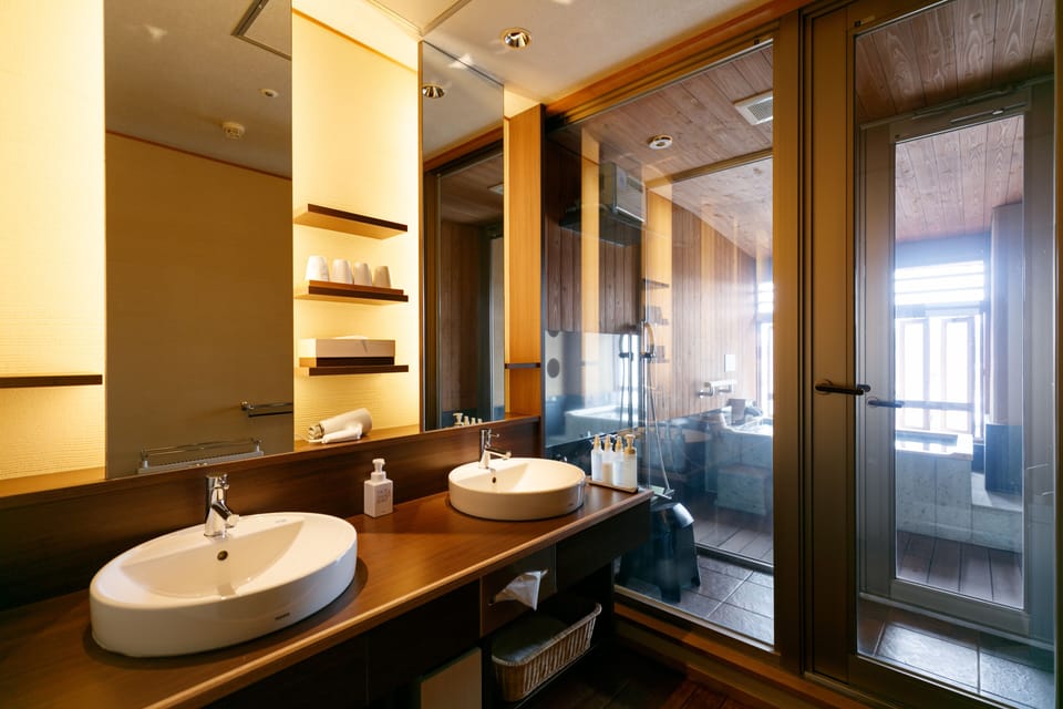 Free toiletries, hair dryer, slippers, electronic bidet