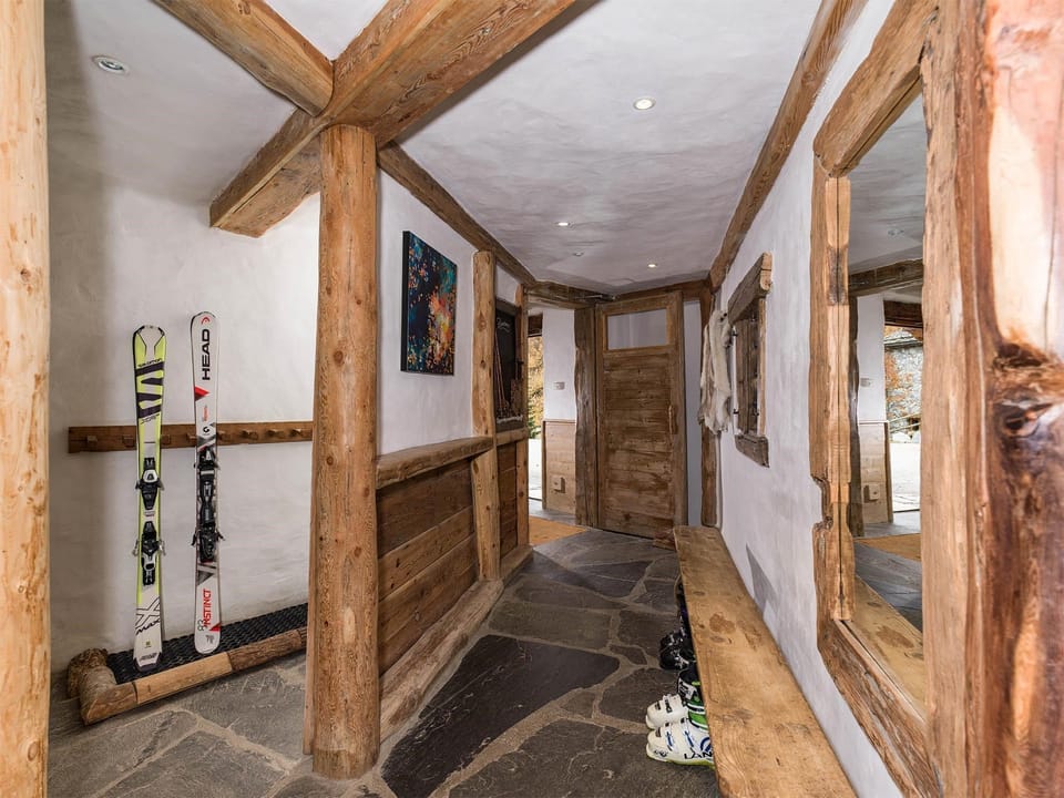 There's plenty of space to store your skis and ski boots.