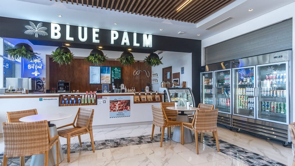 Inside the lobby, enjoy great Starbucks drinks at Blue Palm Cafe.