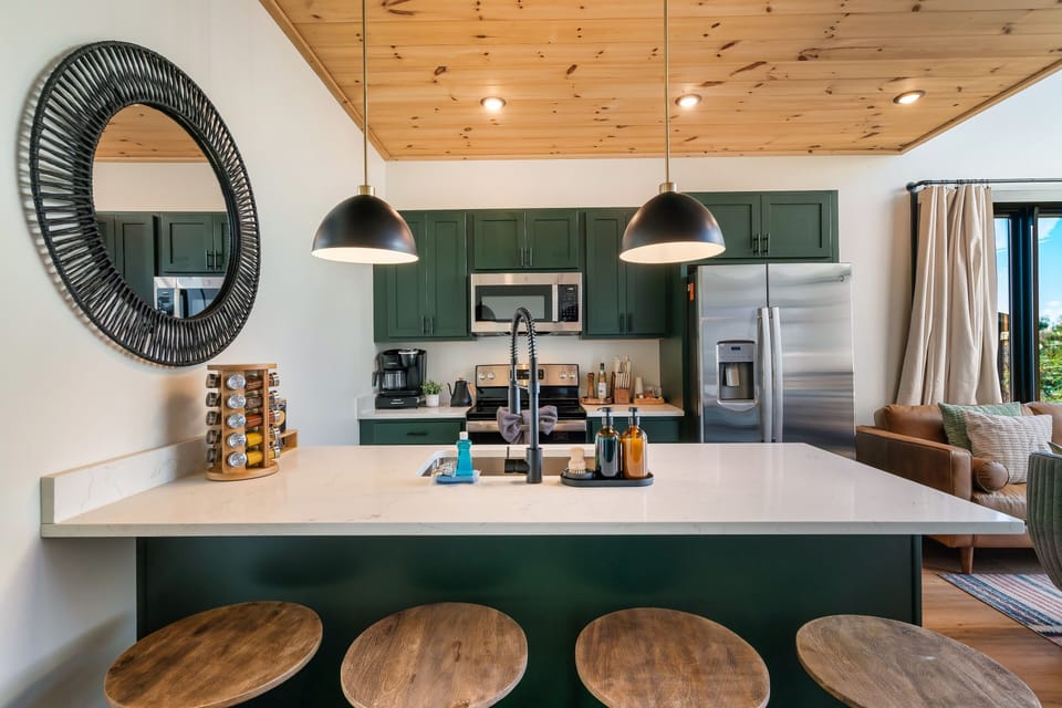 Contemporary kitchen with  dedicated coffee station, spice rack etc