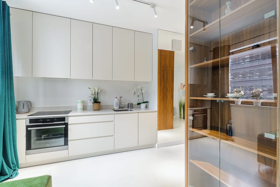 Deluxe Apartment, Balcony, Courtyard View | Private kitchen | Fridge, oven, stovetop, electric kettle