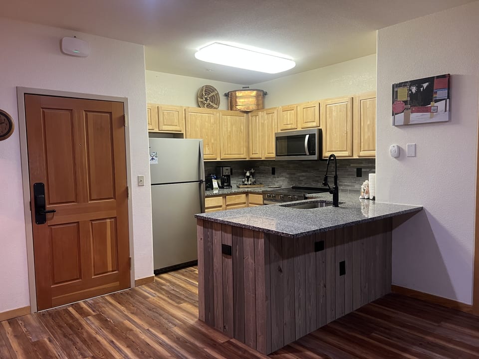 Condo, 2 Bedrooms | Private kitchen | Coffee/tea maker, fridge, oven, electric kettle