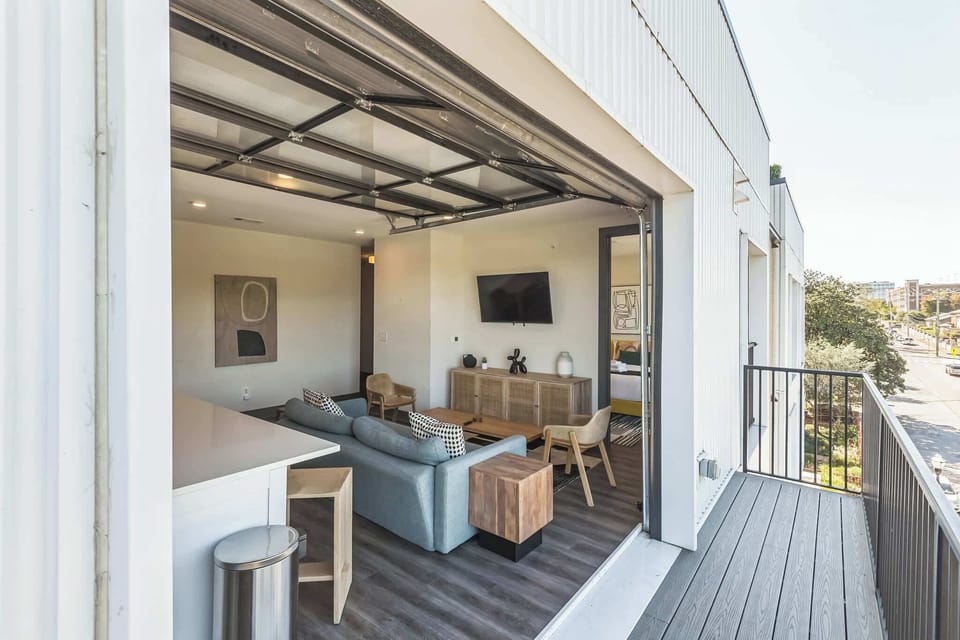 Enjoy the fresh air with the balcony garage door