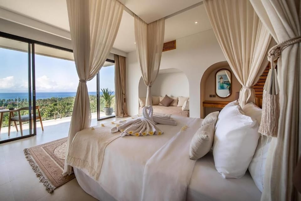 Deluxe Triple Room, Ocean View | Desk, laptop workspace, free WiFi
