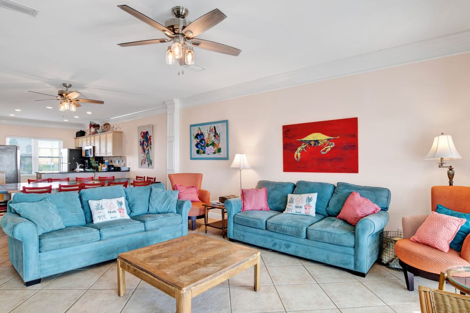 The living area is equipped with a sofa sleeper for 2