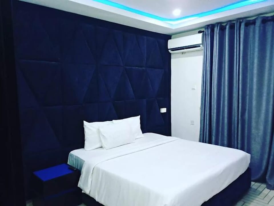 Economy Room, Balcony, City View | Desk, laptop workspace, free WiFi