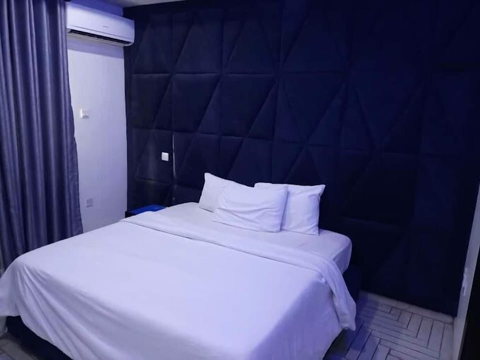 Economy Room, Balcony, City View | Desk, laptop workspace, free WiFi