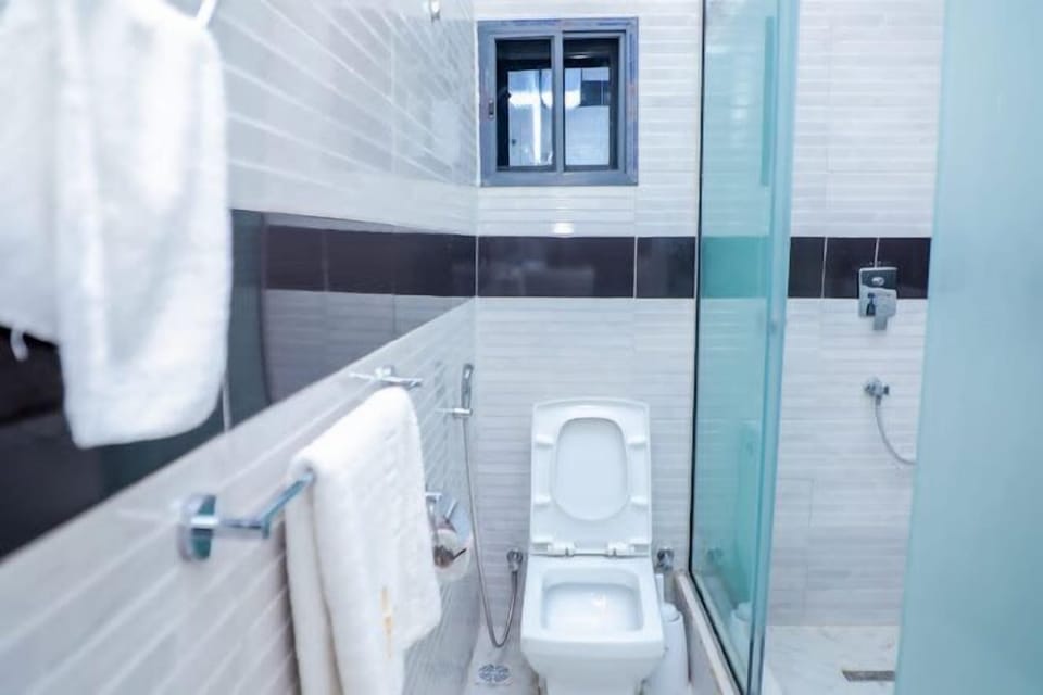 Economy Room, Balcony, City View | Bathroom | Free toiletries, hair dryer, towels, soap