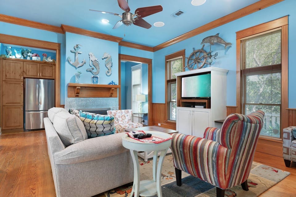 Step into the cozy living room, where comfort and warmth create the perfect space to relax.