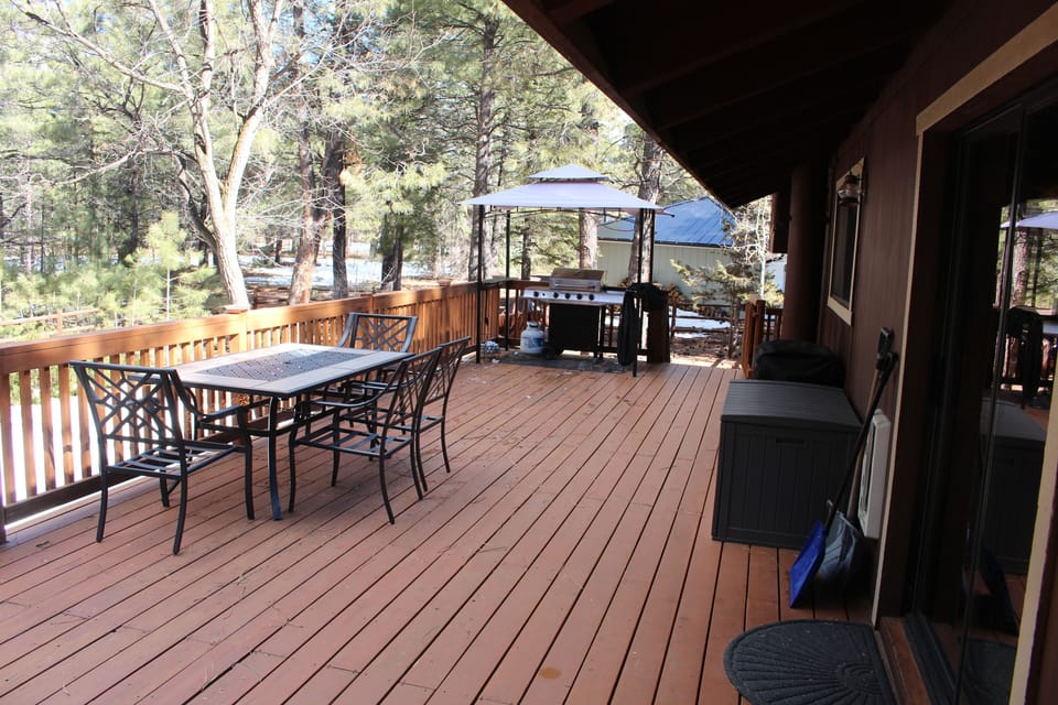 Table seats 4 (6 with chairs from side deck). Cushions in deck box.  Covered BBQ