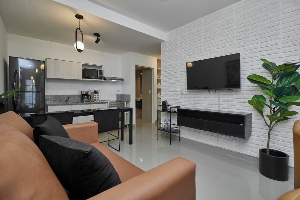 Superior Apartment, Balcony | Living area | Flat-screen TV