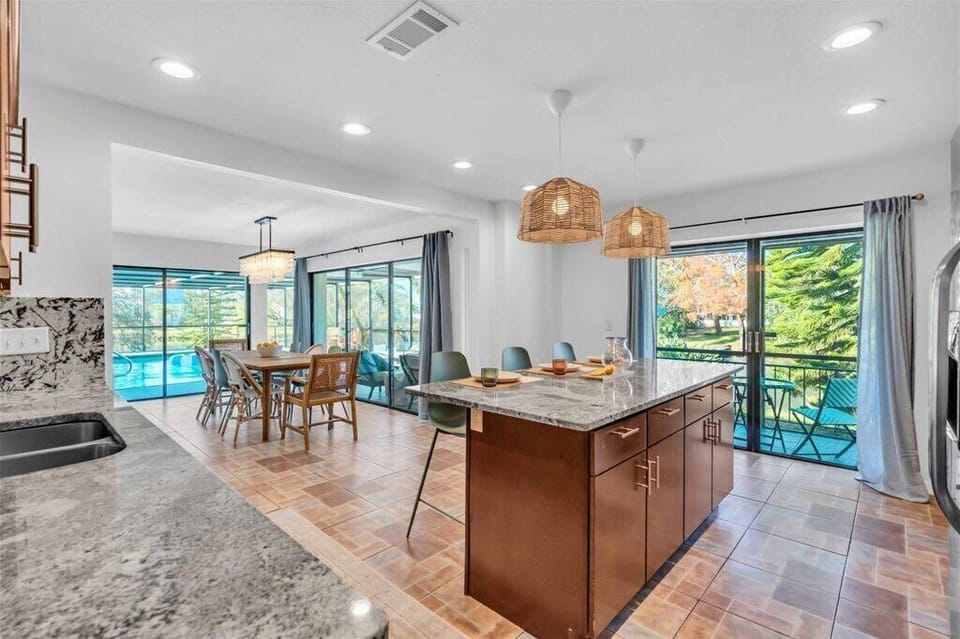 Large Kitchen and Dining Area with seating at the Island.