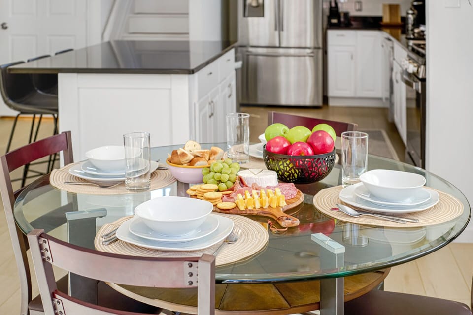 Dining table with seating for four people. 