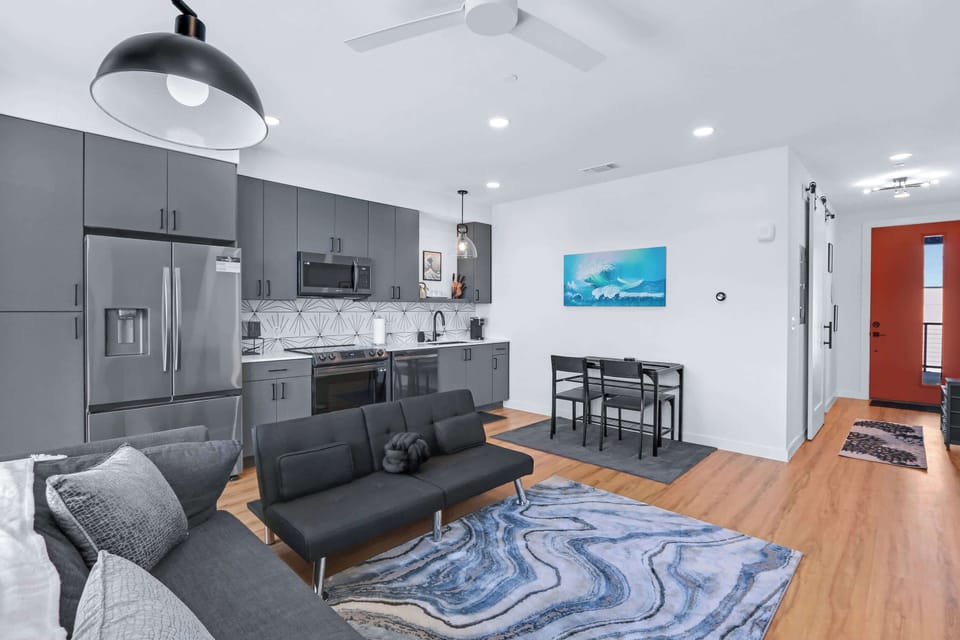 Curl up in the chic living room & stream all your favorite entertainment