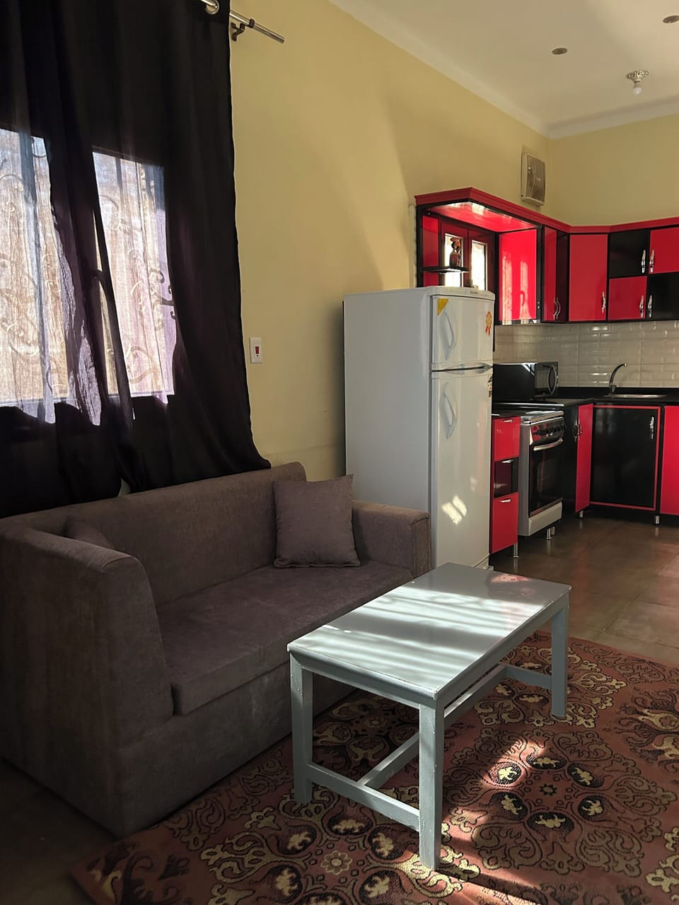 Two Bedroom Apartment | Living area | 32-inch Smart TV with satellite channels, fireplace