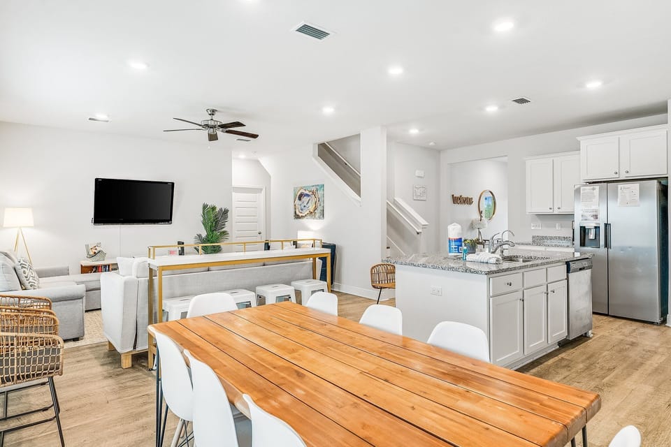Your open-concept space flows seamlessly from kitchen to dining to living room, perfect for gathering and creating memories together.
