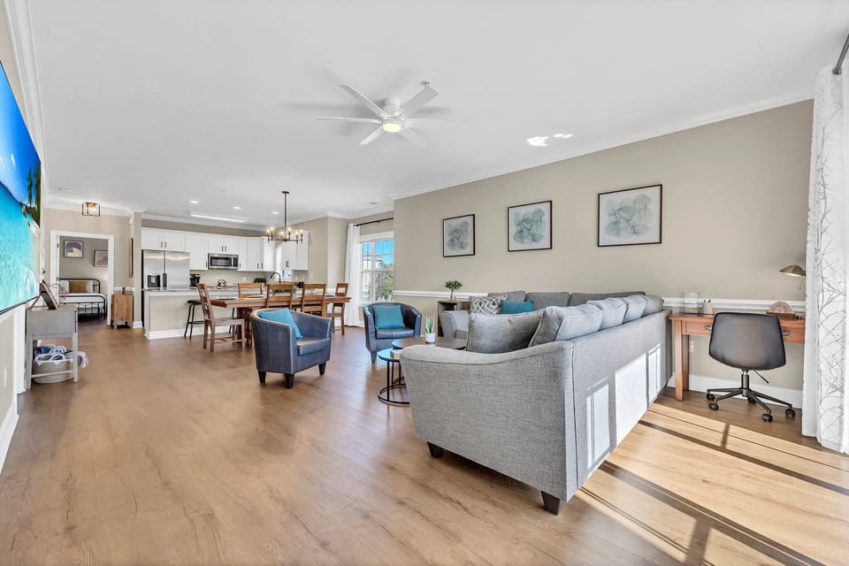 The spacious open floor plan encourages family gatherings. 