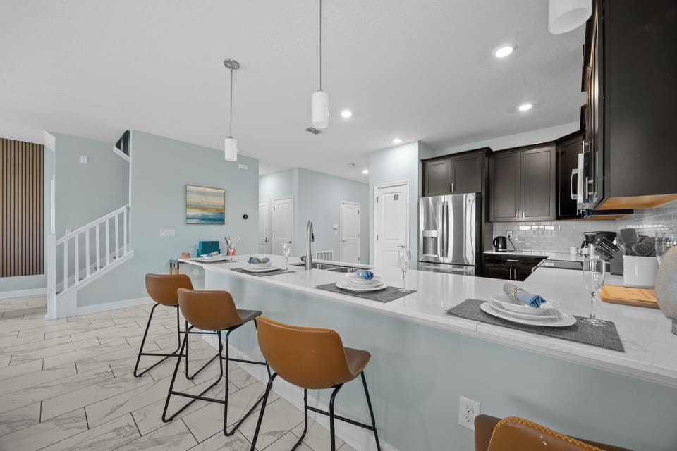Fully Stocked Kitchen with Bar Seating 