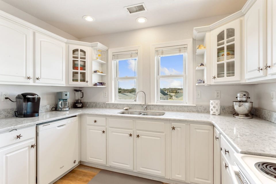The well-equipped Kitchen and adjacent Dining Area make it easy to enjoy meals together.