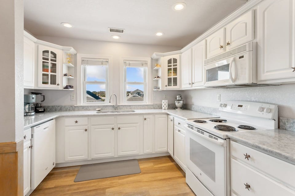 The well-equipped Kitchen and adjacent Dining Area make it easy to enjoy meals together.