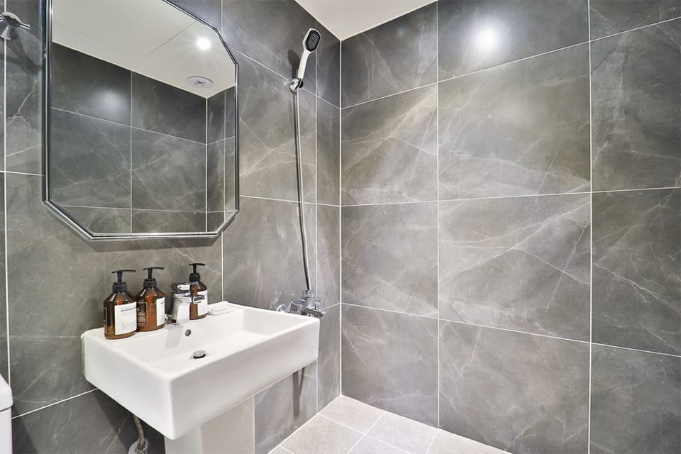 Shower, hair dryer, bathrobes, slippers