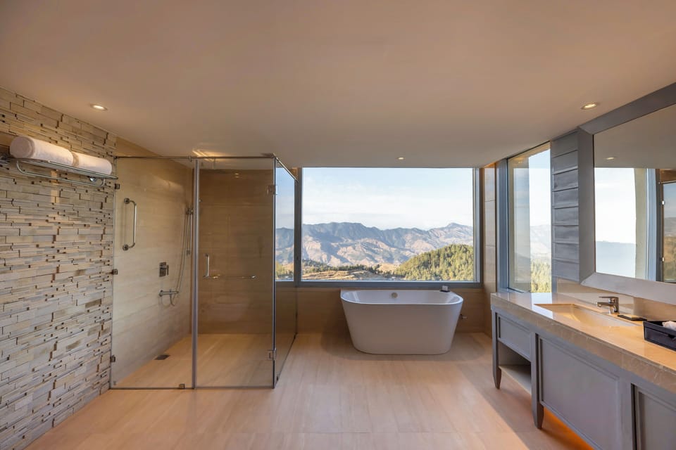 Presidential Suite, 1 King Bed, Mountain View (Private Balconies) | Bathroom | Hair dryer, bathrobes, slippers, towels