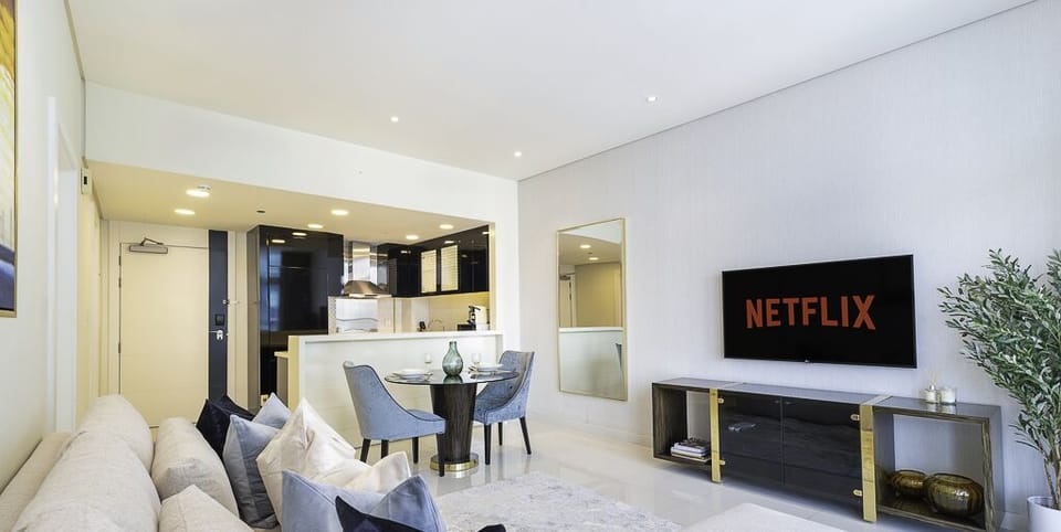 Apartment, Balcony, Canal View | Living area | Flat-screen TV