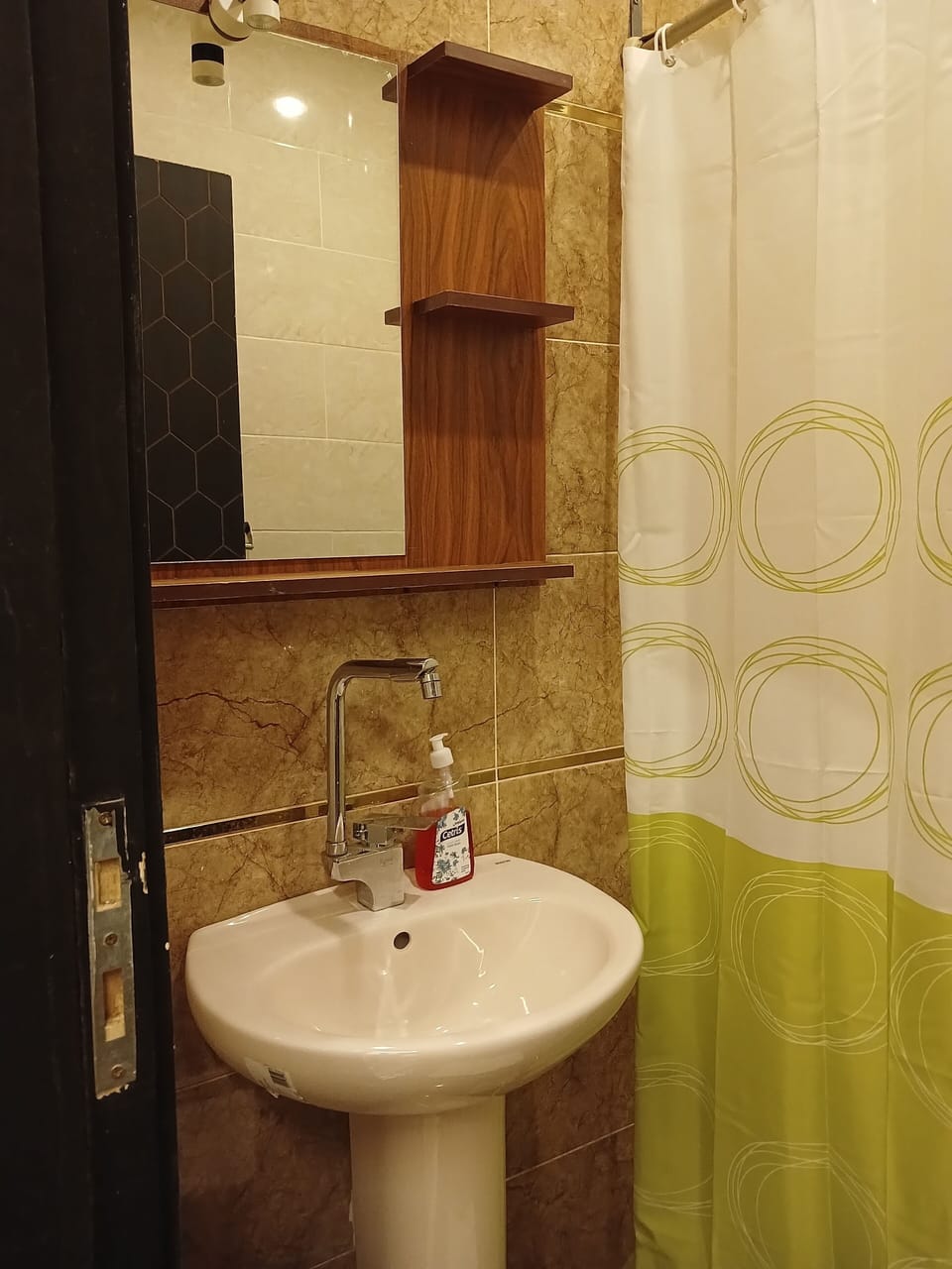 Shower, hair dryer, slippers, towels