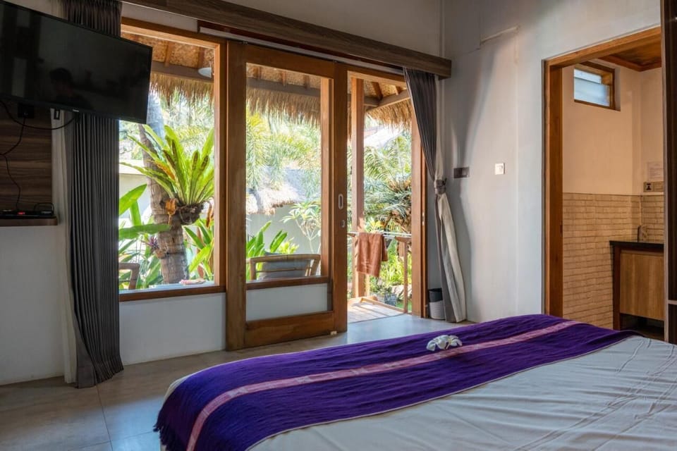 Deluxe Double Room, Garden View | Desk, laptop workspace, free WiFi