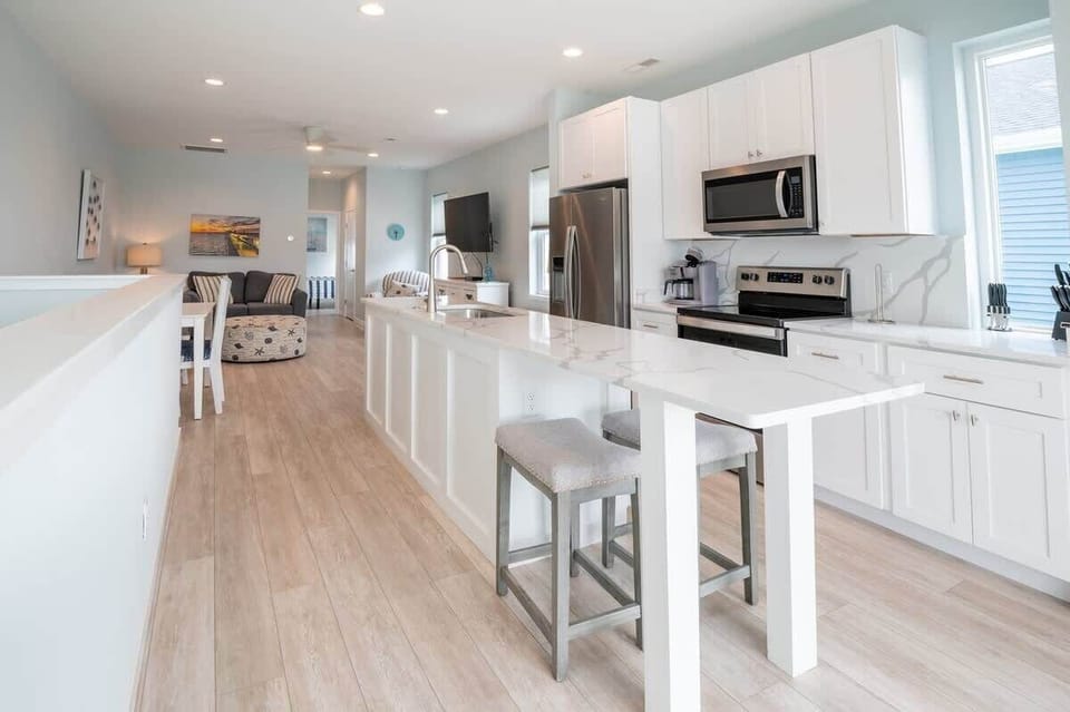 Each Side has Kitchen with Quartz Counters