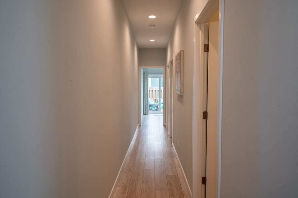 Once Upon A Tide-Ground Level Hall to Back Yard