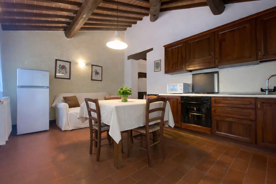 Apartment, 1 Bedroom FORNO 2 | Private kitchen | Full-size fridge, oven, highchair, cookware/dishes/utensils