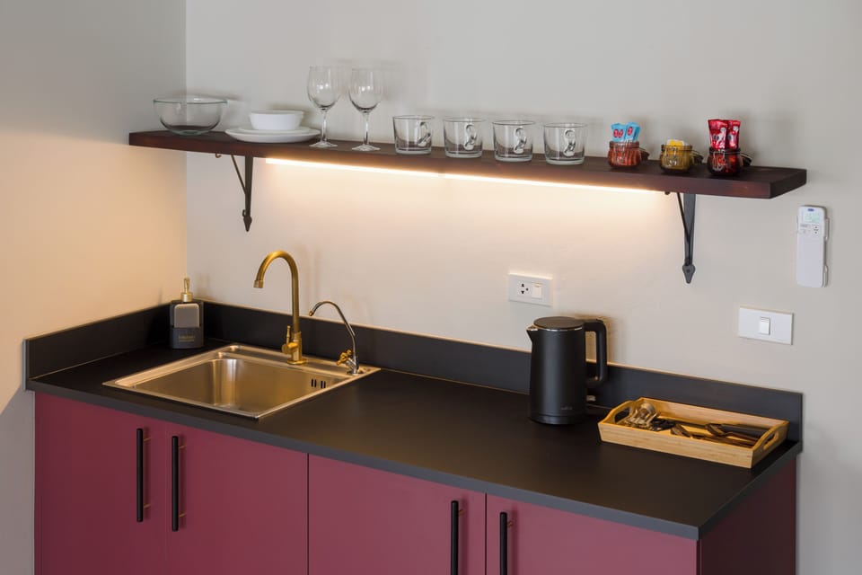 Design Studio Suite, 1 Bedroom, Bathtub, City View | Private kitchenette | Mini-fridge, microwave, electric kettle, cookware/dishes/utensils