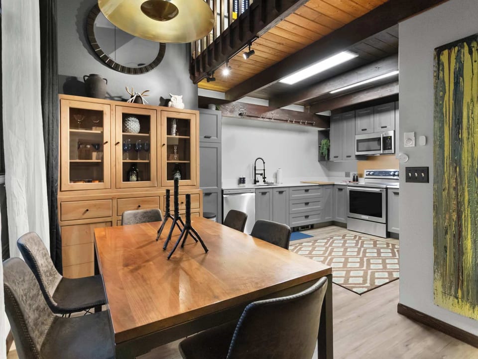 Gather, cook, and connect in this stylish kitchen and dining space—perfect for group meals, cozy nights in, and memory-making with Cascadia Getaways.