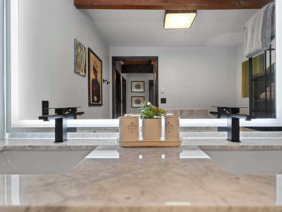 Enjoy the convenience of double sinks! Plenty of space to get ready comfortably. 