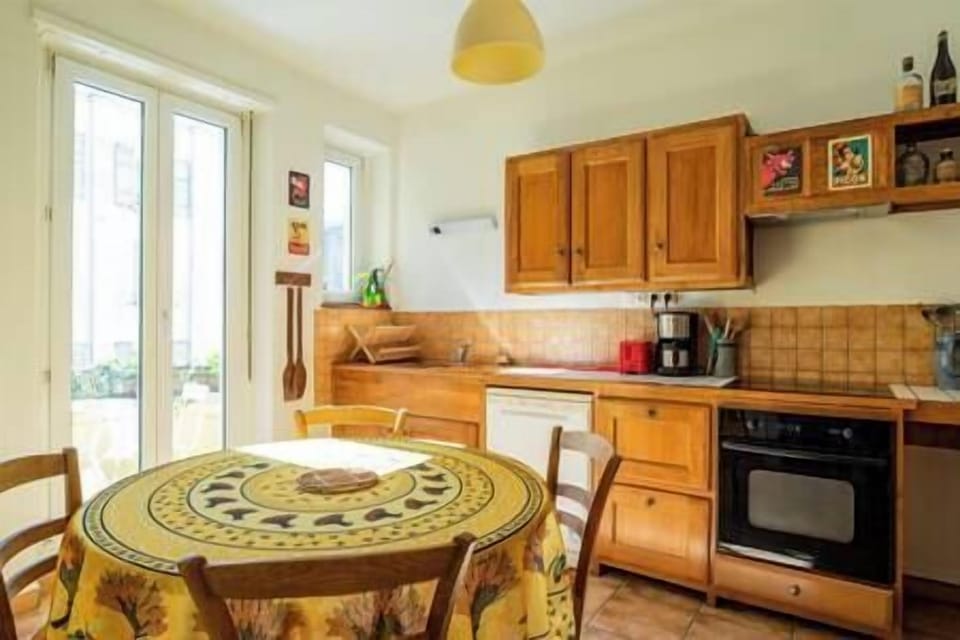 large kitchen and small balcony