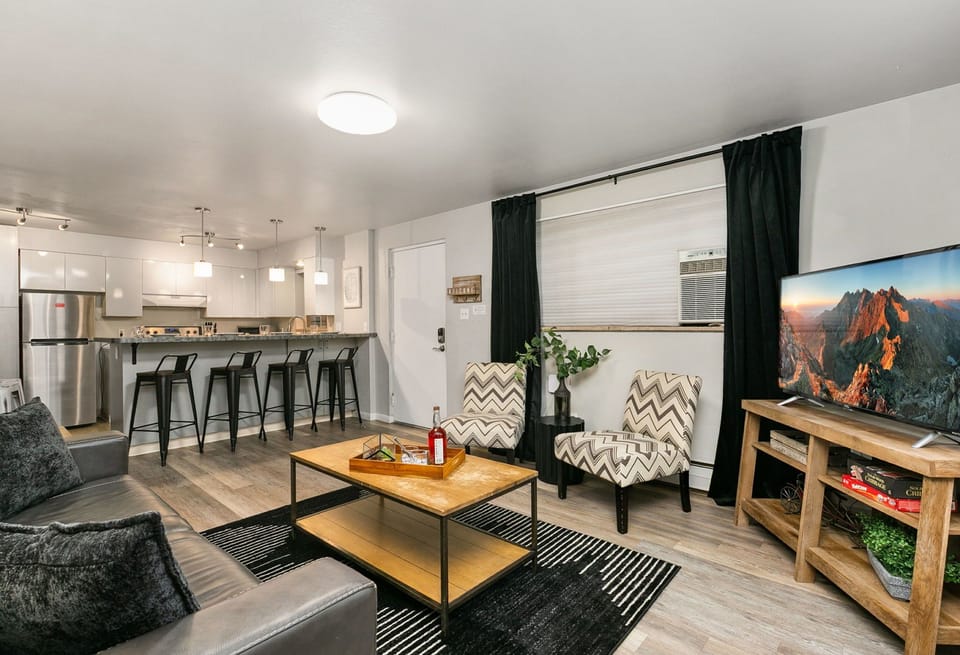 220 Peterson St. (Unit 1) | Living Area with Smart TV