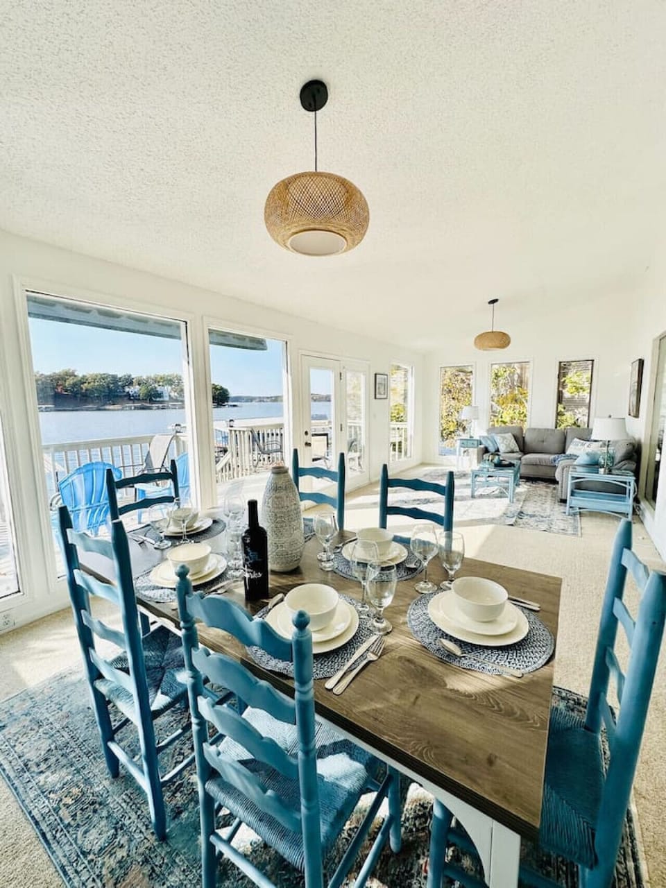 Spacious dining area with direct views of the sparkling lake.