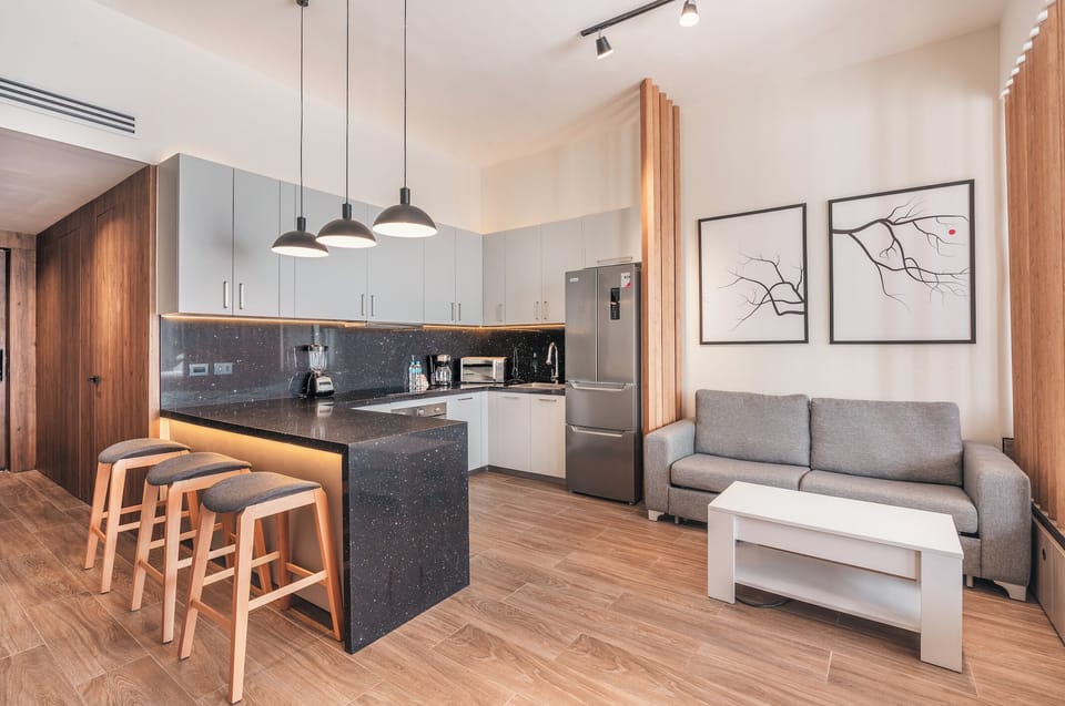 Junior Studio, Balcony | Living area | 55-inch Smart TV with cable channels