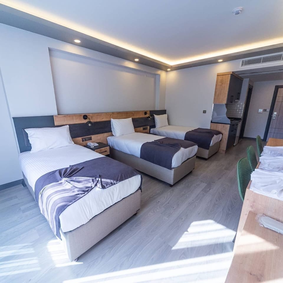 Comfort Triple Room | In-room safe, desk, laptop workspace, blackout drapes