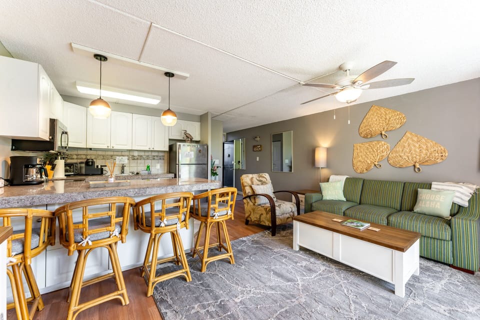 Great Room with window AC, queen sleeper sofa, cable and smart TV, free Wifi, spacious kitchen with dining area and lanai  with small seating area