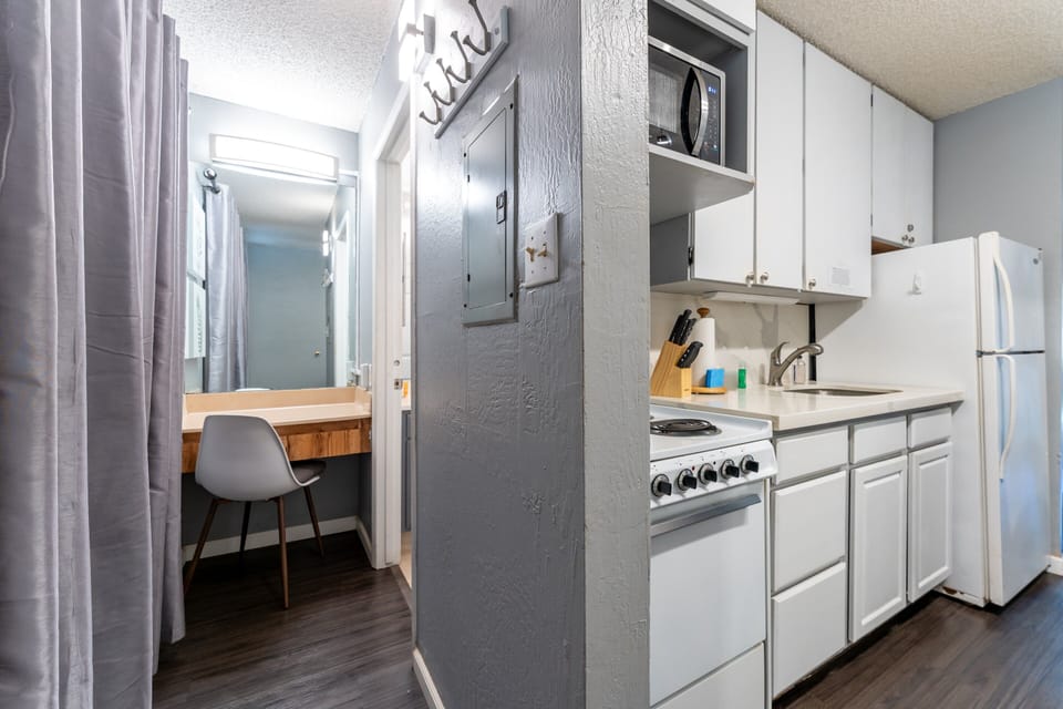 Kitchen and vanity area, linen, towels and beach towels are provided