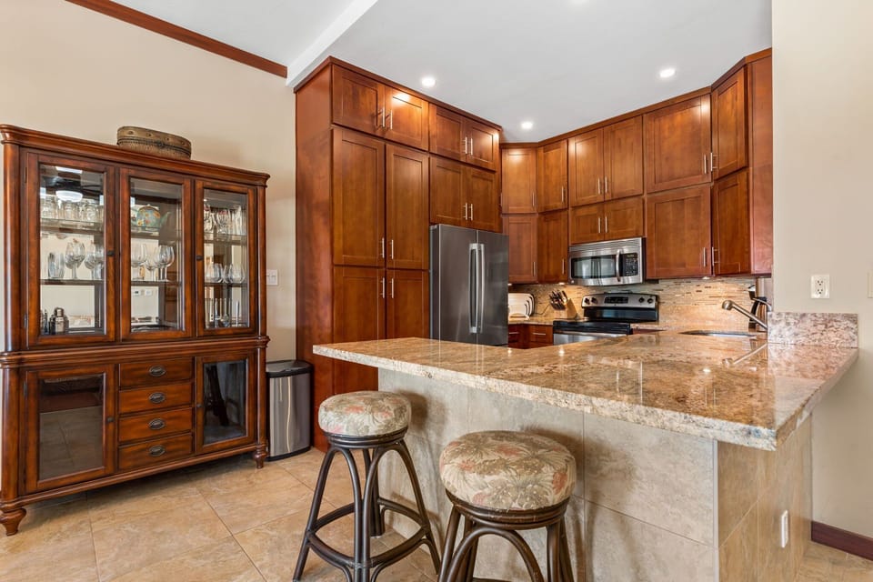 Beautiful renovated kitchen with fridge, stove, oven, dishwasher, microwave, coffee maker, toaster and many more